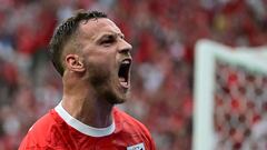 Austria's forward #07 Marko Arnautovic celebrates scoring his team's third goal during the UEFA Euro 2024 Group D football match between Poland and Austria at the Olympiastadion in Berlin on June 21, 2024. (Photo by JOHN MACDOUGALL / AFP)