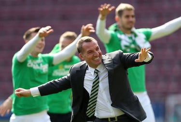 Celtic claim sixth consecutive SPL crown in Hearts demolition