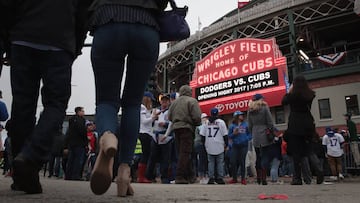 CHICAGO, IL - APRIL 10: Fans arrive at Wrigley Field for the 2017 home opener against the Los Angeles Dodgers on April 10, 2017 in Chicago, Illinois. The Cubs defeated the Cleveland Indians in seven games to win the 2016 World Series.   Scott Olson/Getty Images/AFP
 == FOR NEWSPAPERS, INTERNET, TELCOS &amp; TELEVISION USE ONLY ==