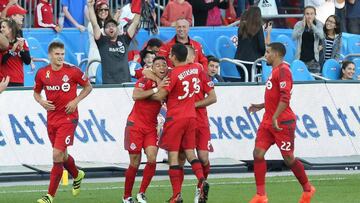 Toronto FC defender Justin Morrow (2) celebrates his second half goal against the Philadelphia Union with teammates at BMO Field. Mandatory 