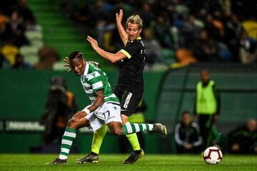 Sporting's Cape Verdean Jovane Cabral vies with Rio Ave's Portuguese defender Fabio Coentrao.