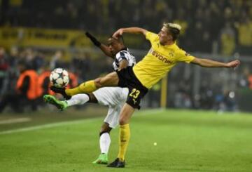 Patrice Evra y Kevin Kampl.