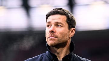 Bayer Leverkusen's Spanish head coach Xabi Alonso reacts prior during the German first division Bundesliga football match between FC Augsburg and Bayer 04 Leverkusen in Augsburg on December 14, 2024. (Photo by Kirill KUDRYAVTSEV / AFP) / DFL REGULATIONS PROHIBIT ANY USE OF PHOTOGRAPHS AS IMAGE SEQUENCES AND/OR QUASI-VIDEO