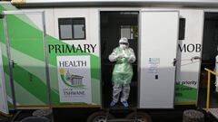 A City of Tshwane Health official stands at the mobile testing unit while waiting to conduct tests for the COVID-19 coronavirus at the Bloed Street Mall in Pretoria Central Business District, on June 11, 2020. (Photo by Phill Magakoe / AFP)