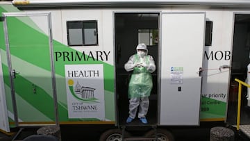 A City of Tshwane Health official stands at the mobile testing unit while waiting to conduct tests for the COVID-19 coronavirus at the Bloed Street Mall in Pretoria Central Business District, on June 11, 2020. (Photo by Phill Magakoe / AFP)