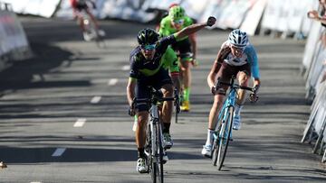 Movistar's Spanish rider Alejandro Valverde celebrates as he crosses first the finish line followed by Cannondale's Colombian rider Rigoberto Uran (R) during the fifth stage of the 2017 Tour of the Basque country (Vuelta Ciclista al Pais Vasco) a 139.8km route between Bilbao and Eibar, on April 7, 2017. / AFP PHOTO / CESAR MANSO