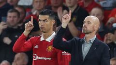 Soccer Football - Premier League - Manchester United v Liverpool - Old Trafford, Manchester, Britain - August 22, 2022 Manchester United's Cristiano Ronaldo with manager Erik ten Hag before coming on as a substitute REUTERS/Phil Noble EDITORIAL USE ONLY. No use with unauthorized audio, video, data, fixture lists, club/league logos or 'live' services. Online in-match use limited to 75 images, no video emulation. No use in betting, games or single club /league/player publications.  Please contact your account representative for further details.