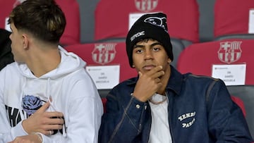 Barcelona's Spanish forward #19 Lamine Yamal injured is pictured in the stands prior the UEFA Champions League, league phase day 5 football match between FC Barcelona and Stade Brestois 29 (Brest) at the Estadi Olimpic Lluis Companys in Barcelona, on November 26, 2024. (Photo by MANAURE QUINTERO / AFP)