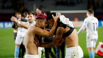 Soccer Football - LaLiga - FC Barcelona v Girona - Estadi Olimpic Lluis Companys, Barcelona, Spain - December 10, 2023 Girona's Yan Couto celebrates with teammate after the match REUTERS/Albert Gea