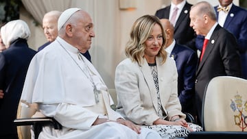 FILE PHOTO: Pope Francis sits with Italian Prime Minister Giorgia Meloni, as they attend a family photo session, on the second day of the G7 summit at the Borgo Egnazia resort, in Savelletri, Italy, June 14, 2024. REUTERS/Louisa Gouliamaki/File Photo