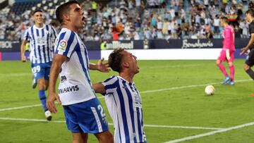 Paulino y Víctor Gómez celebran el 1-0 al Girona.