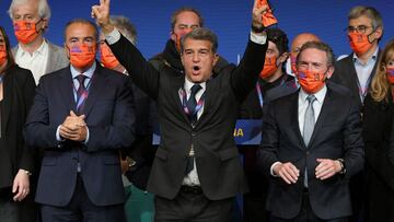 Spanish lawyer Joan Laporta (C) celebrates his victory at the auditorium of the Camp Nou complex after winning the election for the FC Barcelona presidency on March 7, 2021 in Barcelona. - Joan Laporta, 58, returned as Barcelona president today after winn