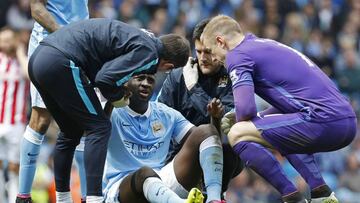 Yaya Toure receives treatment after sustaining an injury against Stoke