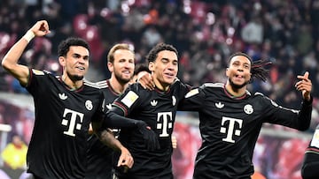 dpatop - 17 January 2026, Saxony, Leipzig: Soccer: Bundesliga, RB Leipzig - Bayern Munich, Matchday 18, Red Bull Arena, Michael Olise (r, Bayern Munich) celebrates his goal with teammates Luis Díaz (l-r, Bayern Munich), Harry Kane (back, Bayern Munich) and Jamal Musiala (Bayern Munich) to make it 1:5. IMPORTANT NOTE: In accordance with the regulations of the DFL German Football League and the DFB German Football Association, it is prohibited to exploit or have exploited photographs taken in the stadium and/or of the match in the form of sequential images and/or video-like photo series. Photo: David Hammersen/dpa (Photo by David Hammersen/picture alliance via Getty Images)