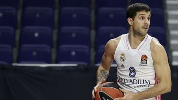 MADRID, SPAIN - DECEMBER 22: Nicolas Laprovittola, #8 of Real Madrid jumps for the ball during the 2020/2021 Turkish Airlines EuroLeague match between Real Madrid and Alba Berlin at Wizink Center on December 22, 2020 in Madrid, Spain. (Photo by Angel Martinez/Euroleague Basketball via Getty Images)