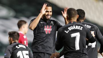 Granada's Yangel Herrera, center, celebrates his goal against Omonia during the Europa League group E soccer match between Omonia and Granada at GSP stadium in Nicosia, Cyprus, Thursday, Nov. 5, 2020. (AP Photo/Petros Karadjias)