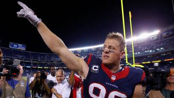 FILE PHOTO: Houston Texans defensive end J.J. Watt points to fans after defeating the San Diego Chargers following their Monday Night NFL football game in San Diego, California, U.S.,  September 9, 2013.  REUTERS/Mike Blake/File Photo
