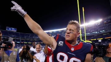 FILE PHOTO: Houston Texans defensive end J.J. Watt points to fans after defeating the San Diego Chargers following their Monday Night NFL football game in San Diego, California, U.S., September 9, 2013. REUTERS/Mike Blake/File Photo