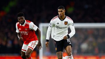 Soccer Football - Premier League - Arsenal v Manchester United - Emirates Stadium, London, Britain - January 22, 2023 Arsenal's Thomas Partey in action with Manchester United's Marcus Rashford Action Images via Reuters/Peter Cziborra EDITORIAL USE ONLY. No use with unauthorized audio, video, data, fixture lists, club/league logos or 'live' services. Online in-match use limited to 75 images, no video emulation. No use in betting, games or single club /league/player publications.  Please contact your account representative for further details.