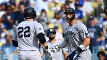 Jun 1, 2025; Los Angeles, California, USA; New York Yankees designated hitter Ben Rice (22) celebrates his two-run home run with right fielder Aaron Judge (99) against the Los Angeles Dodgers during the third inning at Dodger Stadium. Mandatory Credit: Jonathan Hui-Imagn Images