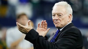 Jerry Jones, owner of the Dallas Cowboys, claps for his team.