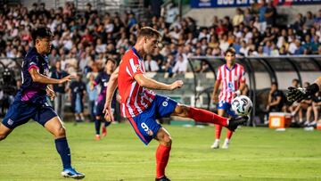 Atletico Madrid's Alexander Sorloth (C) strikes the ball during a friendly football match between Hong Kong�s Kitchee and Spain's Atletico Madrid at the Hong Kong stadium in Hong Kong on August 7, 2024. (Photo by Isaac LAWRENCE / AFP)