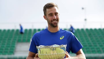 NOTTINGHAM, ENGLAND - JUNE 25: Steve Johnson of USA walks off Centre Court with his trophy after winning the men&#039;s singles match against Pablo Cuevas of Uruguay during day six of the ATP Aegon Open Nottingham at Nottingham Tennis Centre on June 25, 2016 in Nottingham, England.  (Photo by Daniel Smith/Getty Images)