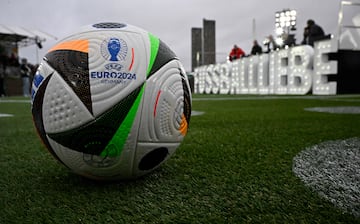 The official ball is pictured on November 15, 2023 in front of the Olympic Stadium in Berlin, Germany, during an event organised by sports equipment maker Adidas to present the official ball for the 2024 UEFA European Football Championship. (Photo by Tobias SCHWARZ / AFP)