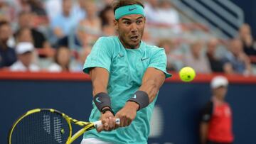 Tennis - Rogers Cup Montreal
 
 09 August 2019, Canada, Montreal: Spanish tennis player Rafael Nadal in action against Italian tennis player Fabio Fognini during their men&#039;s singles quarter final tennis match of the Rogers Cup Montreal tennis tournam