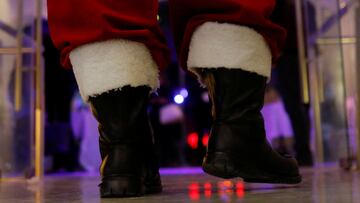 A man dressed as Santa Claus is seen during a Christmas sales event in Ciudad Juarez, Mexico November 30, 2023. REUTERS/Jose Luis Gonzalez