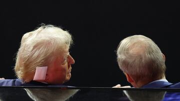 Republican presidential nominee and former U.S. President Donald Trump speaks with Representative Jim Jordan (R-OH) during Day 2 of the Republican National Convention (RNC), at the Fiserv Forum in Milwaukee, Wisconsin, U.S., July 16, 2024. REUTERS/Andrew Kelly