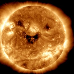 What’s behind the photo of the smiling sun?