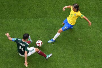 Rafael Marquez y Filipe Luis. 