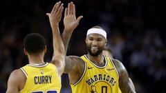 OAKLAND, CALIFORNIA - APRIL 02: DeMarcus Cousins #0 of the Golden State Warriors is congratulated by Stephen Curry #30 after he made a basket against the Denver Nuggets at ORACLE Arena on April 02, 2019 in Oakland, California. NOTE TO USER: User expressly acknowledges and agrees that, by downloading and or using this photograph, User is consenting to the terms and conditions of the Getty Images License Agreement.   Ezra Shaw/Getty Images/AFP
 == FOR NEWSPAPERS, INTERNET, TELCOS &amp; TELEVISION USE ONLY ==