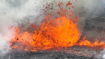 Lava and smoke bursts out from the seismic hotspot not far from Reykjavik, the country’s capital city, as authorities monitor its progress.