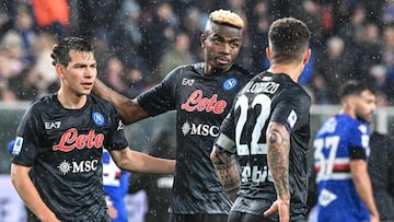 Napoli's Mexican forward Hirving Lozano (L) and Napoli's Nigerian forward Victor Osimhen react at the end of the Italian Serie A football match between Sampdoria and Napoli on January 8, 2023 at the Luigi-Ferraris stadium in Genoa. (Photo by Andreas SOLARO / AFP)