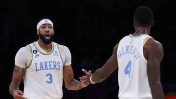 LOS ANGELES, CALIFORNIA - DECEMBER 13: Anthony Davis #3 of the Los Angeles Lakers reacts to Lonnie Walker IV #4 during the first half against the Boston Celtics at Crypto.com Arena on December 13, 2022 in Los Angeles, California. NOTE TO USER: User expressly acknowledges and agrees that, by downloading and/or using this photograph, User is consenting to the terms and conditions of the Getty Images License Agreement. Mandatory Copyright Notice: Copyright 2022 NBAE.   Harry How/Getty Images/AFP (Photo by Harry How / GETTY IMAGES NORTH AMERICA / Getty Images via AFP)