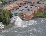 WATCH: Mansion collapses into the river during Alaskan flood
