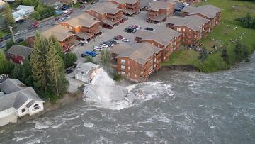 A break in Mendenhall Glacier’s “Suicide Basin” caused major flooding near Juneau, Alaska, resulting in this mansion to completely collapse into a river.