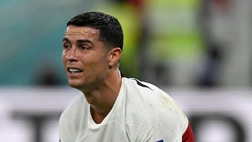 Portugal's forward #07 Cristiano Ronaldo reacts after his team lost the Qatar 2022 World Cup quarter-final football match between Morocco and Portugal at the Al-Thumama Stadium in Doha on December 10, 2022. (Photo by PATRICIA DE MELO MOREIRA / AFP)