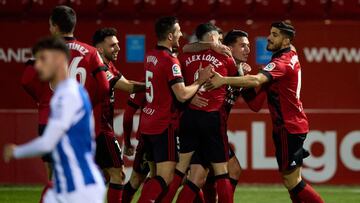 MIRANDA DE EBRO, SPAIN - MARCH 13: Victor Meseguer CD Mirandes celebrates with team mates after scoring their side&#039;s first goal during the Liga Smartbank match between CD Mirandes and RCD Espanyol at Estadio Municipal de Anduva on March 13, 2021 in M