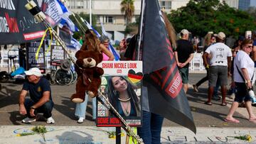 A picture of Shani Nicole Louk, who is missing, is displayed during a demonstration by family members and supporters of hostages who are being held in Gaza after they were kidnapped from Israel by Hamas gunmen, as they call for a dialogue with Israeli Prime Minister Benjamin Netanyahu and Defence Minister Yoav Gallant, in Tel Aviv, Israel October 28, 2023. REUTERS/Ammar Awad