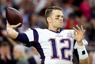 New England Patriots' quarterback Tom Brady warms up before the start of Super Bowl LI against the Atlanta Falcons in Houston, Texas.