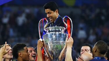 Soccer Football - Champions League - Final - Paris St Germain v Inter Milan - Allianz Arena, Munich, Germany - May 31, 2025 Paris St Germain president Nasser Al-Khelaifi and their players celebrate after winning the Champions League REUTERS/Kai Pfaffenbach