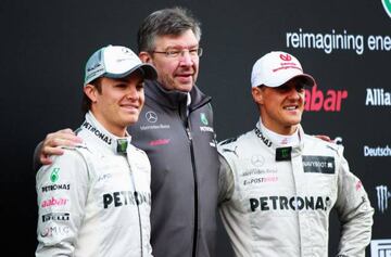 Brawn (centre) with Schumacher (right) and Nico Rosberg at Mercedes.