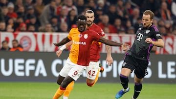 Galatasaray's Colombian defender #06 Davinson Sanchez (L) and Bayern Munich's English forward #09 Harry Kane vie for the ball during the UEFA Champions League Group A football match between FC Bayern Munich and Galatasaray AS in Munich, southern Germany on November 8, 2023. (Photo by MICHAELA REHLE / AFP)