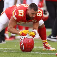 Why does Travis Kelce wear number 87 for the Kansas City Chiefs?