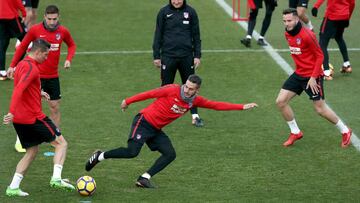 Los jugadores del Atlético durante el entrenamiento.
