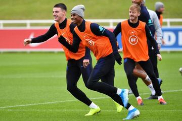 Declan Rice (left) and Marcus Rashford (centre) in training at St George's Park