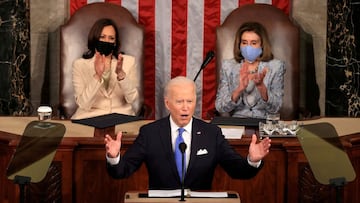 FILE PHOTO: U.S. President Joe Biden addresses a joint session of Congress as Vice President Kamala Harris and Speaker of the House U.S. Rep. Nancy Pelosi (D-CA) applaud, at the U.S. Capitol in Washington, DC, U.S. April 28, 2021. Chip Somodevilla/Pool vi